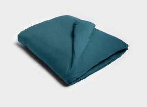 It-Fits quilt cover in petrol green, showcasing a smooth, soft texture, made from certified Australian cotton jersey.