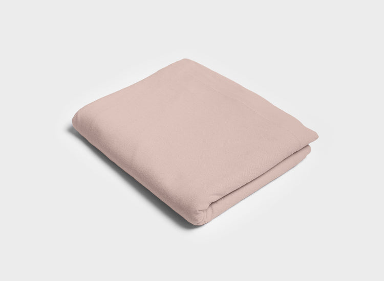 Dusty pink top sheet by It-Fits, folded neatly, made from smooth 100% Australian cotton jersey