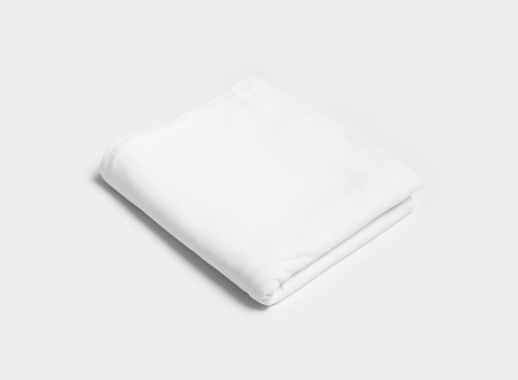 White flat sheet by It-Fits, folded neatly on a white background, crafted from soft, breathable 100% Australian cotton jersey.