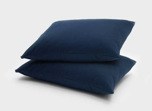 Ultimate comfort pillow slips by It-Fits, made from breathable Australian cotton jersey, 2 pack in navy blue, indicating a restful night’s sleep.