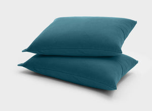 Cooling pillowcases by It-Fits, crafted from smooth Australian cotton jersey, 2 pack in petrol green, indicating luxurious comfort and a cozy sleep.